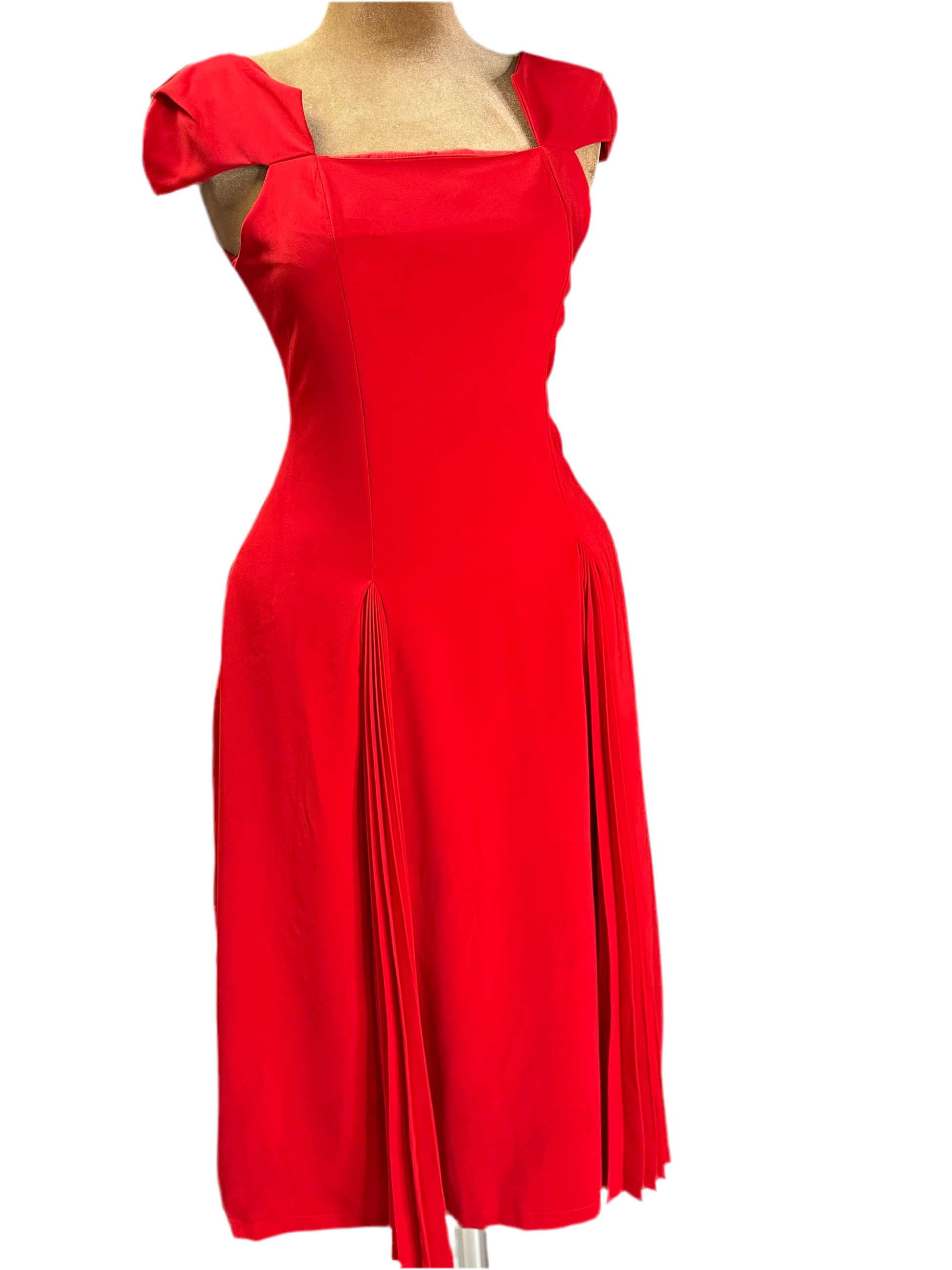 Beautiful armless red dress, featuring a chic neck design