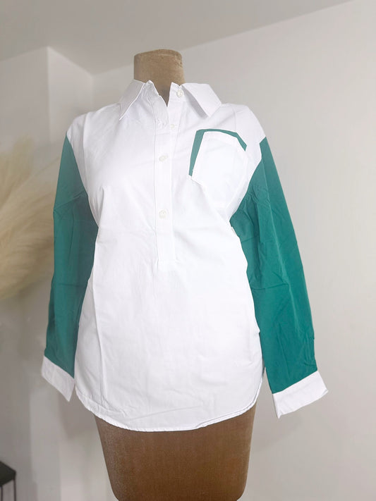 White shirt featuring vibrant green sleeves and a matching green collar.