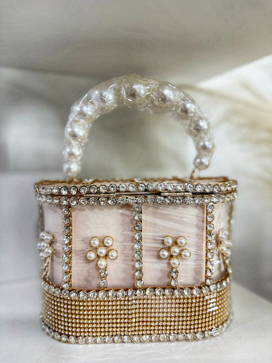 Exquisite pink purse adorned with delicate pearls and shimmering beads