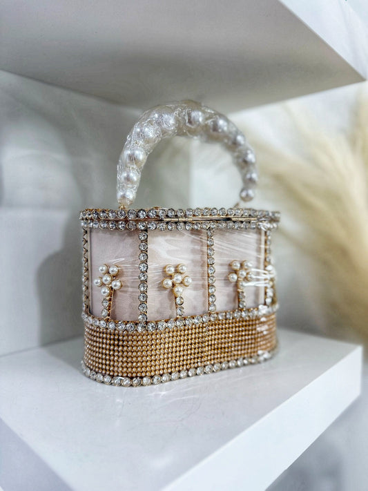 Exquisite pink purse adorned with delicate pearls and shimmering beads
