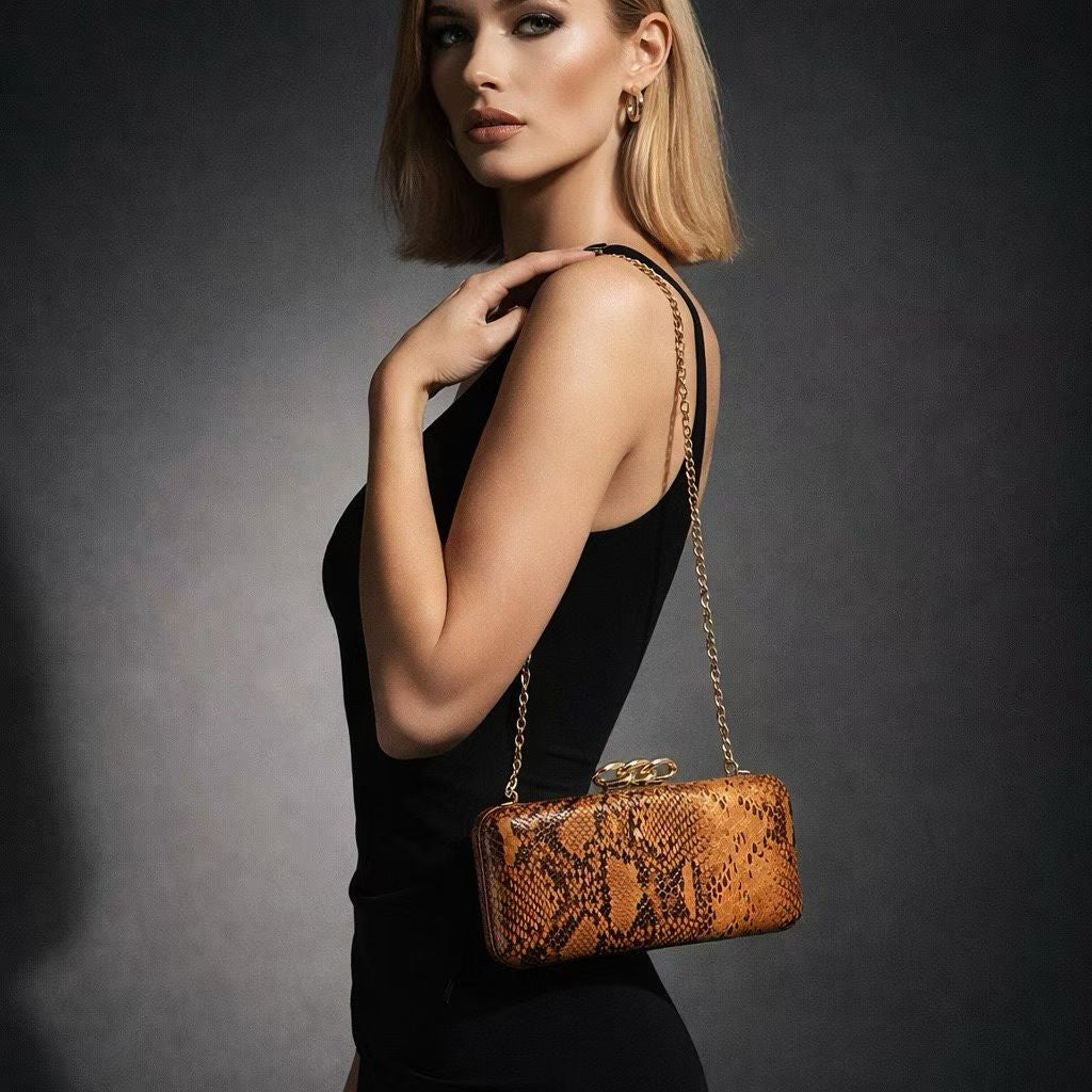 SERPENTINE LUXE CLUTCH  Description: