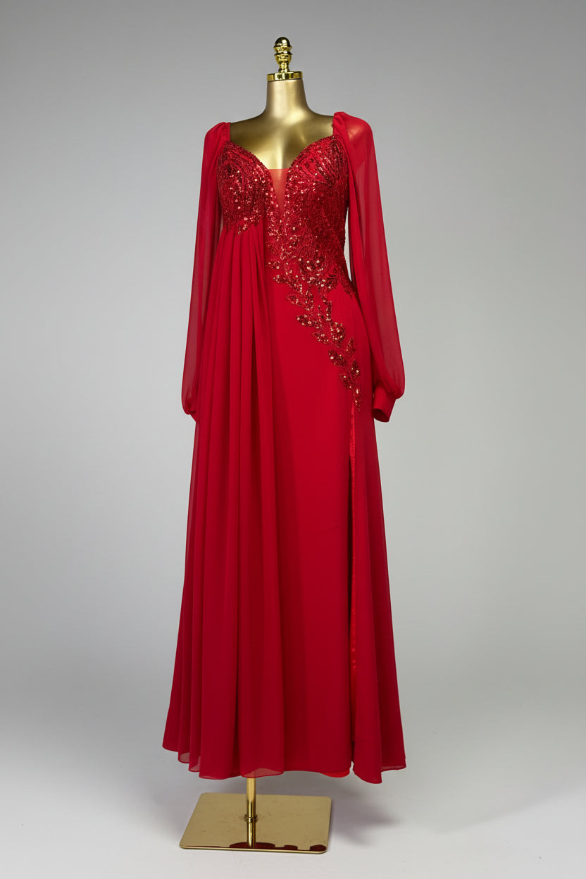 Red evening gown with floral embellishments on a mannequin against a white wall.